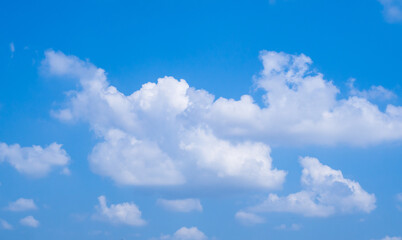 Naklejka na ściany i meble white clouds on turquoise background and clear sky 
