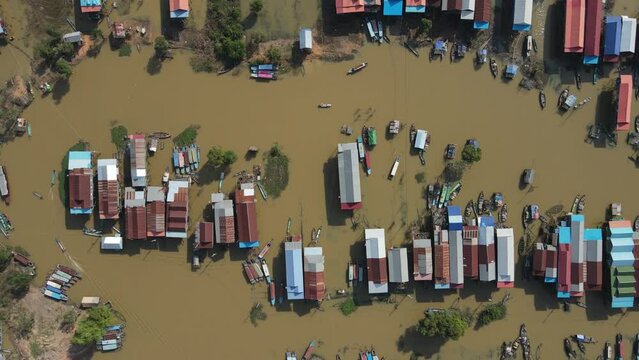 Floating village on a river, Kampong Phluk, Cambodia, Boats, fisherman, 4k Drone footage