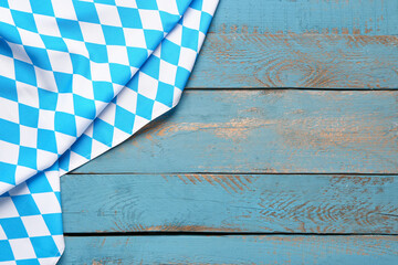 Fototapeta na wymiar Flag of Bavaria on blue wooden background