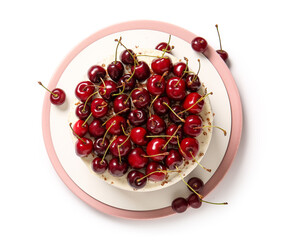 Plate with tasty cherry cake isolated on white background