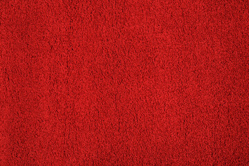 Soft red carpet as background, top view