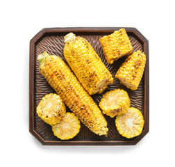 Tray with tasty grilled corn cobs on white background