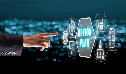 Action plan strategy vision planning direction concept, Business person hand touching action plan icon on VR screen. © Satori Studio