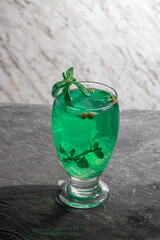 green cocktail with mint
