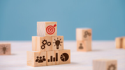 Successful Business Teamwork, Empowering Employees for New Projects and Leadership Success in Corporate Settings. wooden block with icon in goal and success concept.