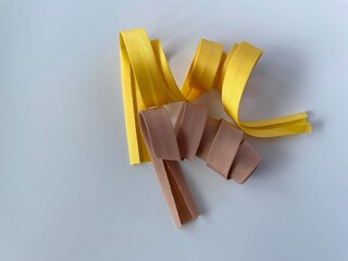 yellow and brown colour bias tapes 
