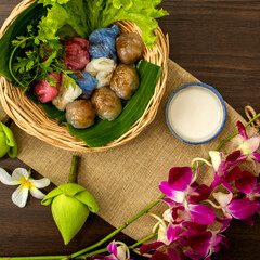 Thai dessert concept, Thai coconut milk custard and tapioca balls with pork filling on basket