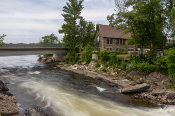 The old stone church remains standing beside Bala Falls in the small cottage town of Bala, Ontario.