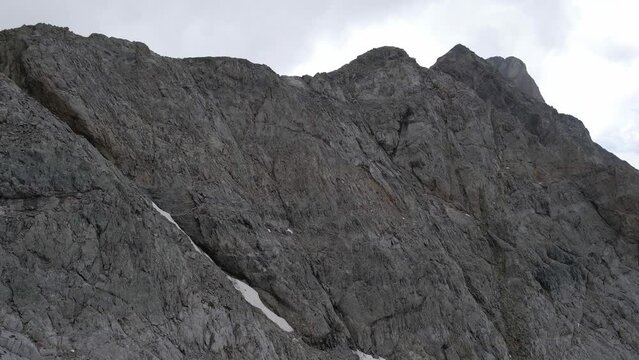 Drone footage of cliffs and the glacier of the Vignemale in the Pyrenees moutains.