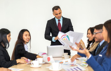 Group of business meeting and discussing strategy with startup project analysis finance,management.Success business people plan and brainstorm,marketing,idea,research,organization in office.Teamwork