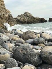Fototapeta na wymiar Beach, Rocks and Waves