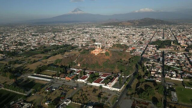 Panoramic drone shot around the Santuario de Nuestra Se&ntilde;ora de Los Remedios, in sunny San Andres Cholula, Mexico