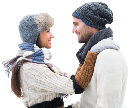 Digital png photo of happy diverse couple with hats embracing on transparent background