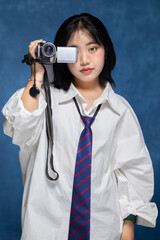Portrait photo American yearbook style of Asian student girl with Douyin make up in uniform....