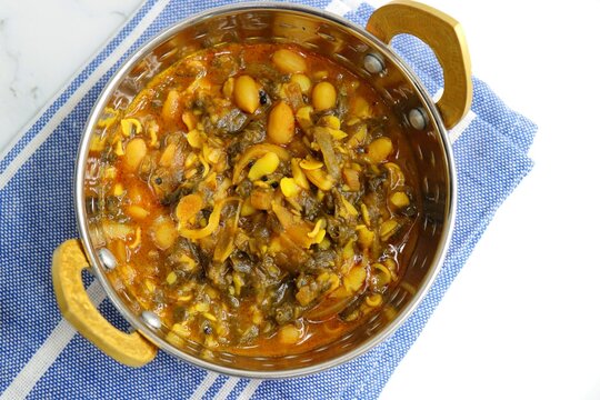 Alucha fatfate or alu wal chi patal bhaji is a traditional, authentic Maharashtrian dish. colocasia leaves and lima beans curry. It has a sweet and sour taste. Valachi bhaji. Fadfade. Monsoon recipes.