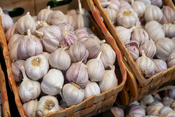 garlic in a basket, Garlic in a basket, Garlic in boxes, background, garlic fruits in wooden box, Lots of baskets with fresh ripe garlic for sale at farmers market closeup, Ai Generate 