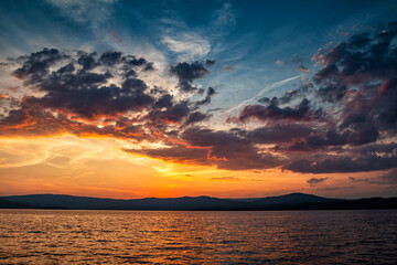A beautiful lake against the backdrop of a scenic sunrise