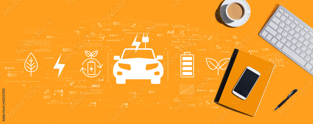 Aufkleber ev concept with a computer keyboard and office items