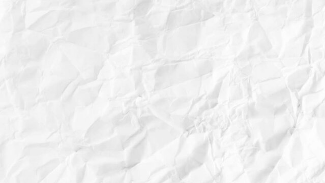 White crumpled paper stop motion animation looping background A ball of paper