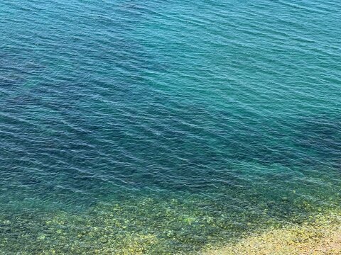 Sea water blue turquoise surface beautiful ocean aerial view. 