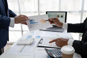 business people meeting in the office Calculate company tax and investment income Strategic planning and colleague brainstorming. Reports. Analyze charts. team work concept.