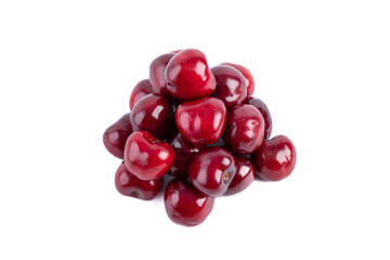 Pile of red sweet cherries. Fruits isolated on white background.