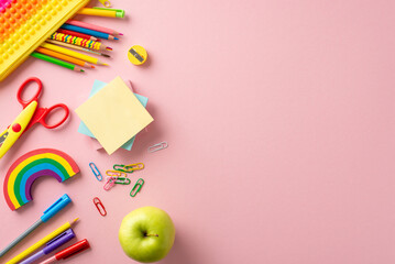 Primary school essentials. Overhead shot of colorful array: sensory fidget case, pencils, sticky...