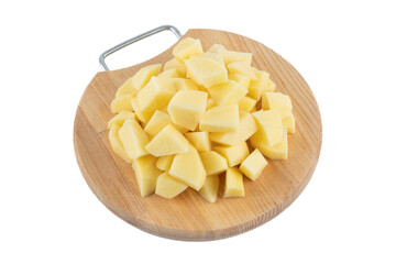 Cutted potatoes cubes on a wooden board. Isolated on white background.