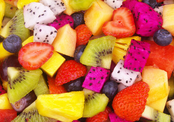 Colorful fruit salad as background. 