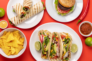 Mexican food featuring tacos, burritos, nachos, burgers
