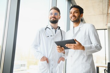 An Indian doctor and an Arab doctor in a hospital