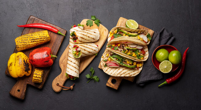 Mexican food featuring tacos, burritos, nachos, burgers