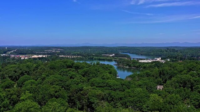 Clemson, SC. University Square Shopping Center. Lake Hartwell. Wooded area with some lakes and buildings.