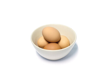 Four egg in the cup with white background.