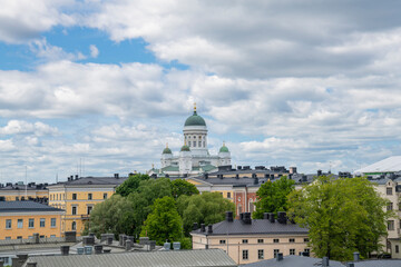 Fototapeta na wymiar View to the city and Helsinki Cathedral (St Nicholas' Church) from The Uspenski Cathedral, Helsinki, Finland