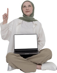 Full body muslim woman in hijab sitting on the ground, holding laptop with empty blank white screen...