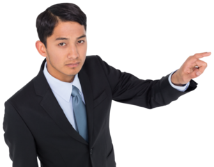 Digital png photo of serious asian businessman pointing finger on transparent background