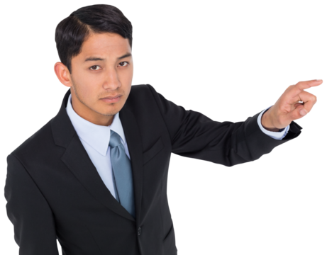 Digital png photo of serious asian businessman pointing finger on transparent background - Powered by Adobe