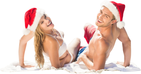 Digital png photo of happy caucasian couple in santa's hat on transparent background