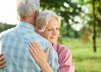 woman man senior couple retirement together elderly hug support love help care friend portrait...