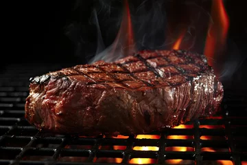 Poster  beef ribeye steak grilling on flaming grill © PinkiePie