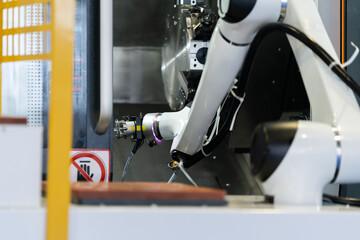 robot arm working in factory