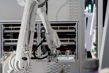 robot arm working in factory