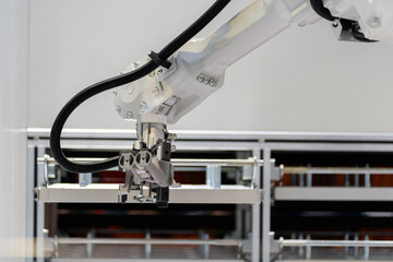 robot arm working in factory