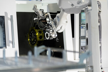 robot arm working in factory