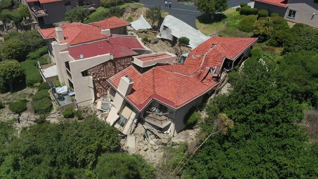 aerial view of erosion - home taken by landslide