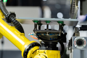 robot arm working in factory