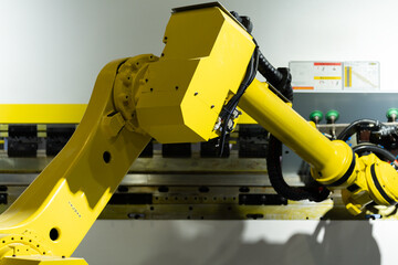 robot arm working in factory