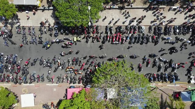 motorcyclist contest, aerial video, motorcycle gangs by the sea