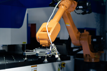 robot arm working in factory